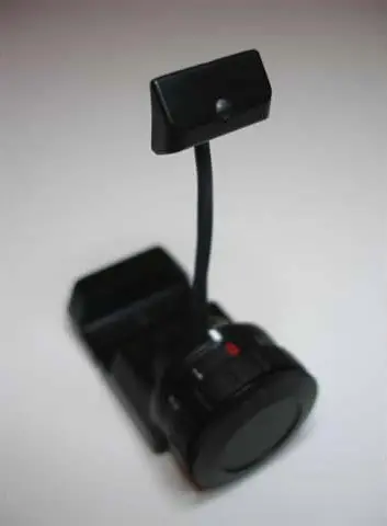 A black camera with a microphone attached to it.