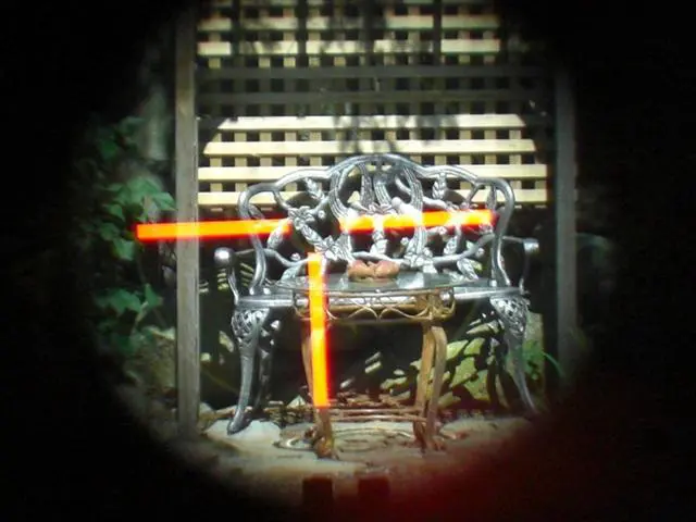 A bench with orange lights in the middle of it.